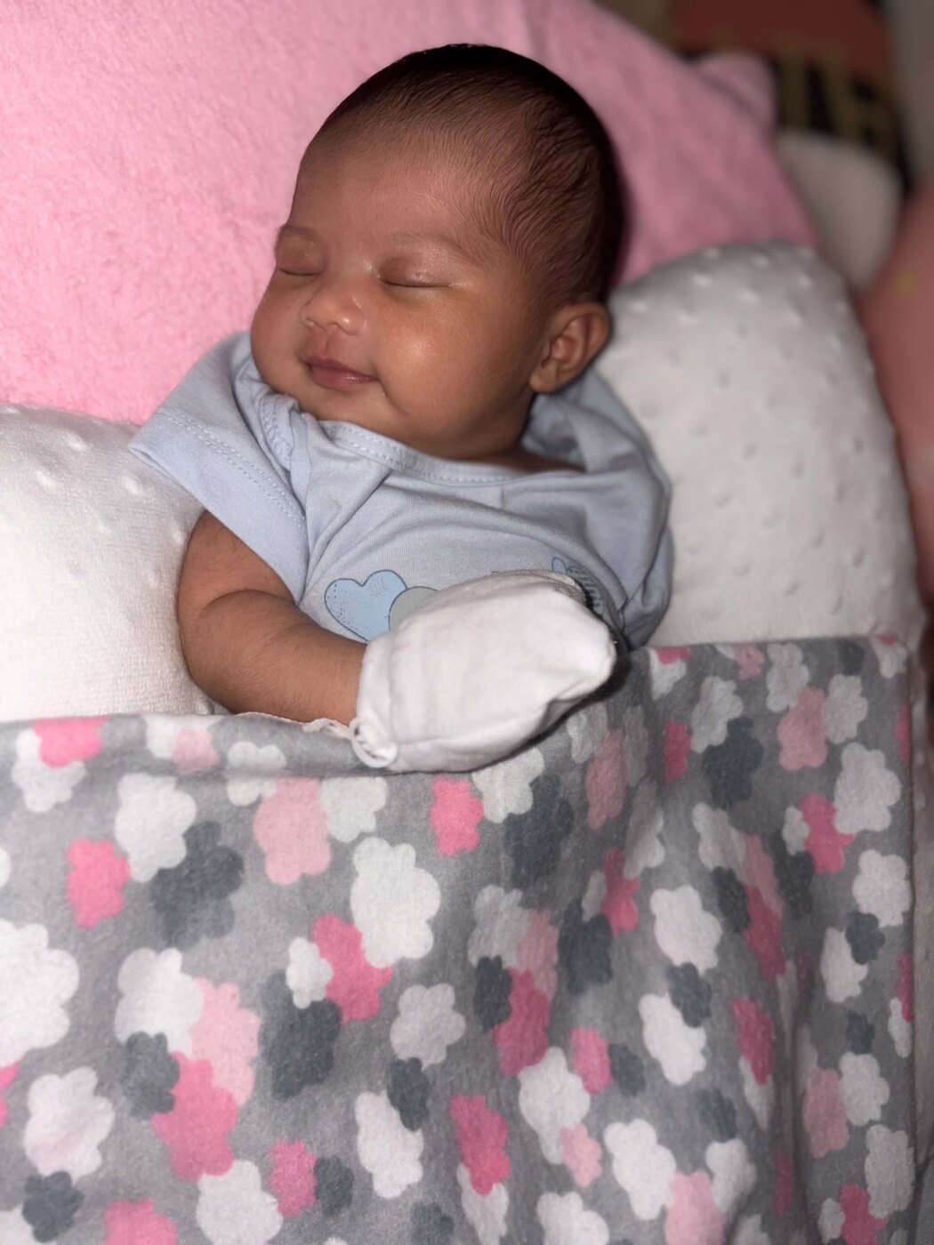 Dorothea Maeve sleeping with a sweet smile